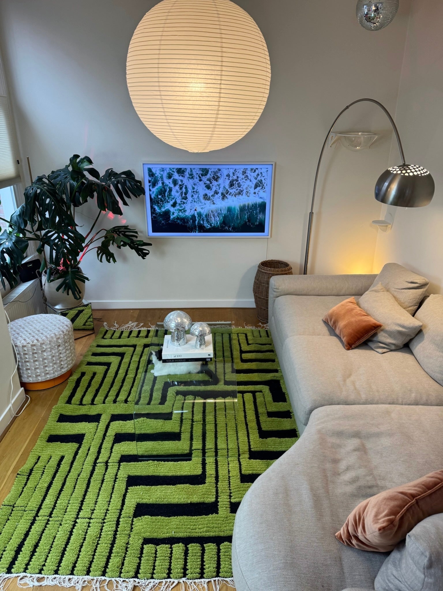 Handwoven wool rug with bold geometric design shown in modern interior