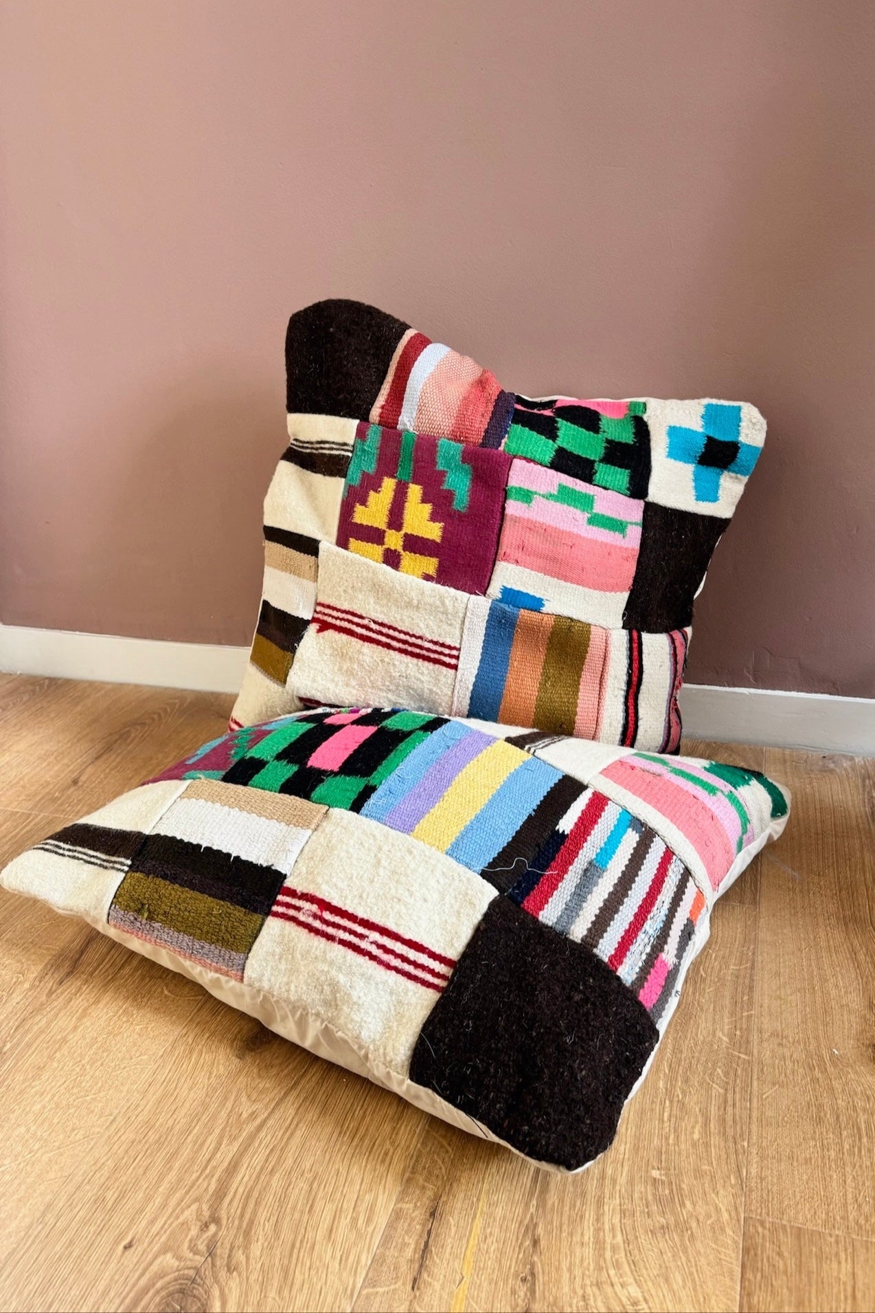 Handmade patchwork wool floor cushion cover Rania in multicolor, full view.