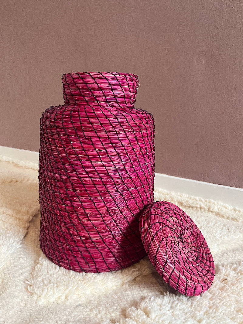 Handmade pink straw basket Nabila with lid removed.